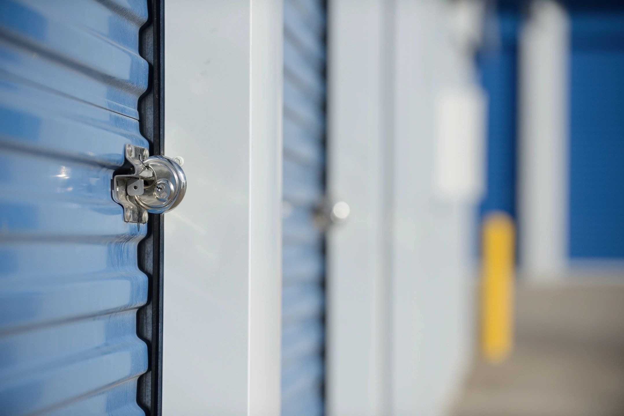 Padlock on a metal storage unit door